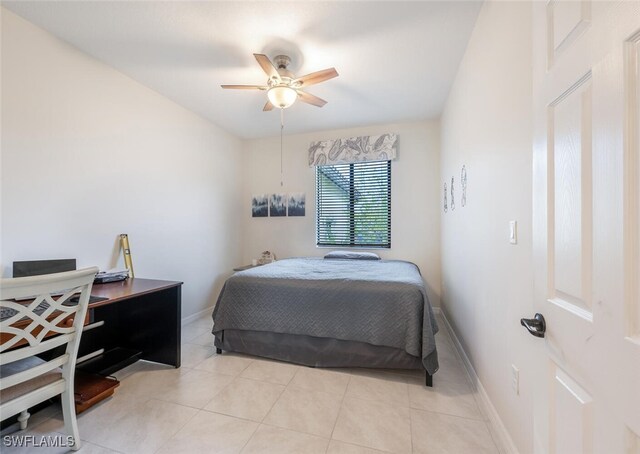 bedroom featuring ceiling fan and light tile patterned flooring