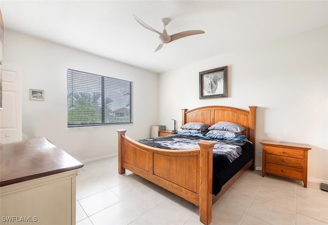 tiled bedroom with ceiling fan