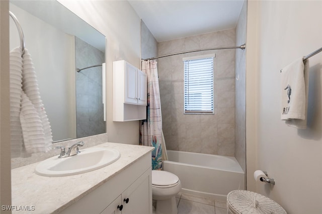 full bathroom featuring tile patterned flooring, vanity, shower / tub combo, and toilet