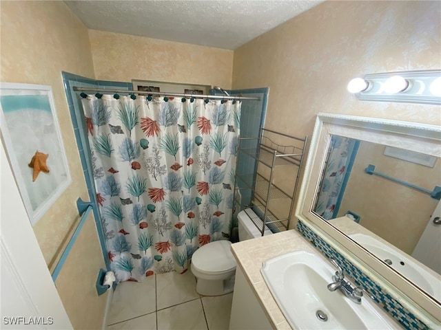 22 Constitution Dr, Naples, FL 34112 - bathroom with a shower with curtain, a textured ceiling, toilet, tile patterned flooring, and vanity
