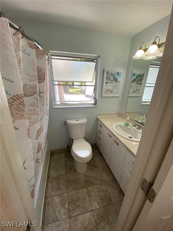 22 Constitution Dr, Naples, FL 34112 - full bathroom with shower / bath combo, toilet, vanity, and plenty of natural light