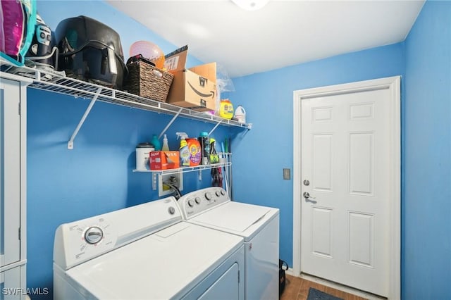 laundry room featuring laundry area and washer and clothes dryer