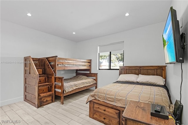 bedroom with light wood-type flooring