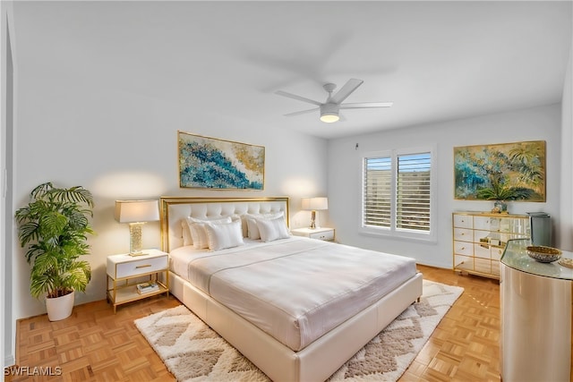 bedroom featuring light parquet flooring and ceiling fan