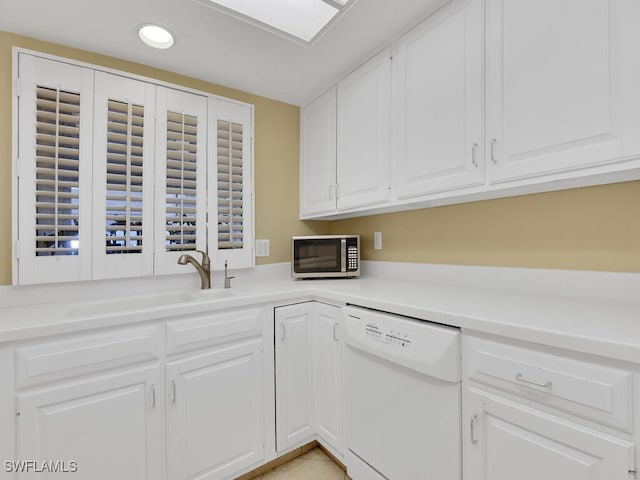 5260 S Landings Dr Unit 805, Fort Myers, FL 33919 - kitchen with white cabinets, a sink, dishwasher, recessed lighting, and stainless steel microwave