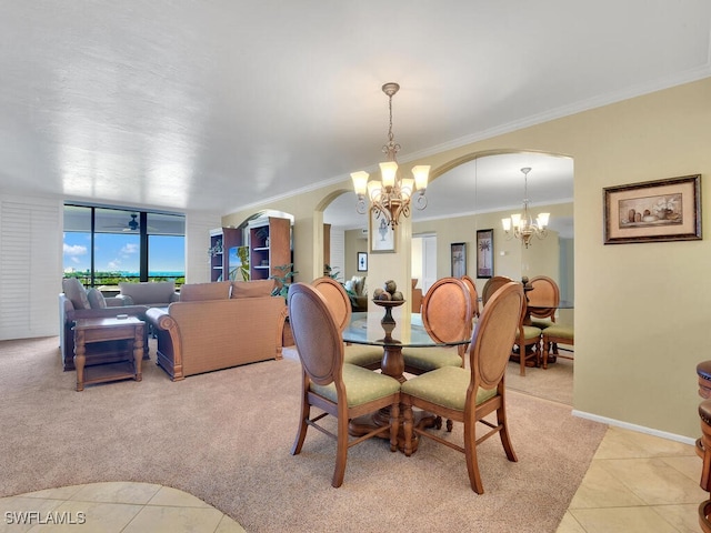 5260 S Landings Dr Unit 805, Fort Myers, FL 33919 - dining area featuring ornamental molding, light tile patterned flooring, light colored carpet, a chandelier, and arched walkways