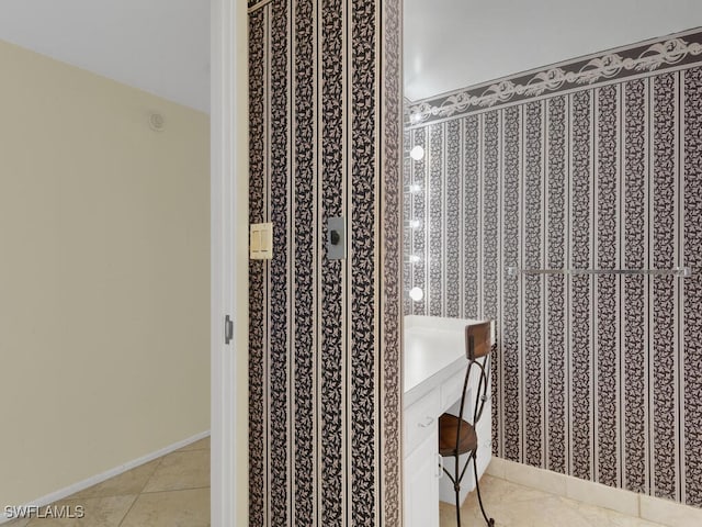 bathroom with tile patterned floors