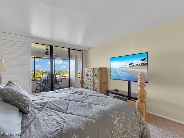 bedroom with carpet flooring and access to exterior