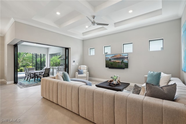 living room with beamed ceiling, ceiling fan, coffered ceiling, ornamental molding, and light tile patterned floors