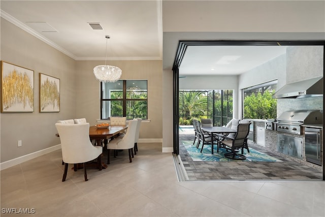 tiled dining space with ornamental molding and an inviting chandelier