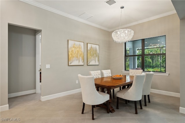 dining room featuring crown molding and a chandelier