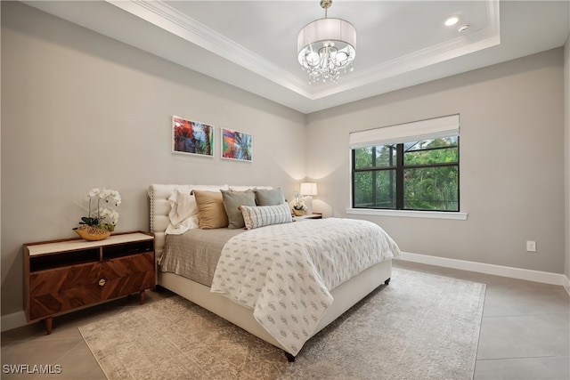 bedroom with a tray ceiling, a chandelier, light tile patterned floors, and crown molding