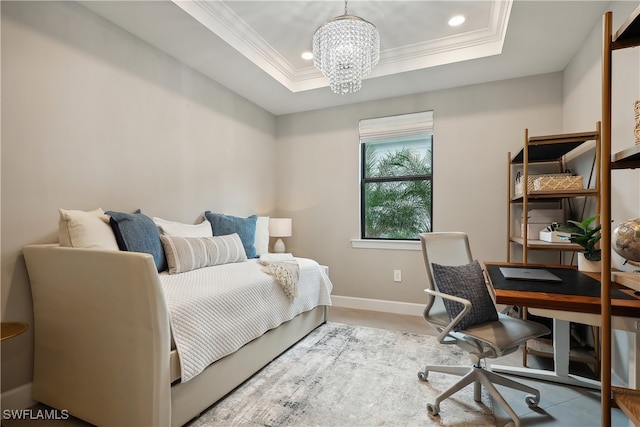 bedroom featuring crown molding, a tray ceiling, and a chandelier