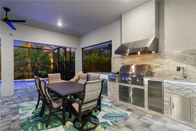 view of patio featuring sink, area for grilling, and grilling area