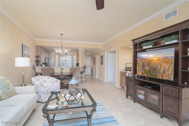 tiled living room featuring ceiling fan with notable chandelier and crown molding