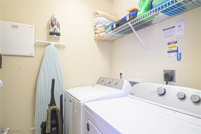 laundry area with washer and clothes dryer