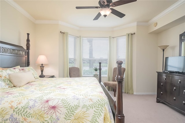 bedroom with light carpet, crown molding, and ceiling fan