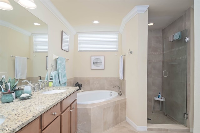 bathroom featuring ornamental molding, tile patterned floors, vanity, and shower with separate bathtub