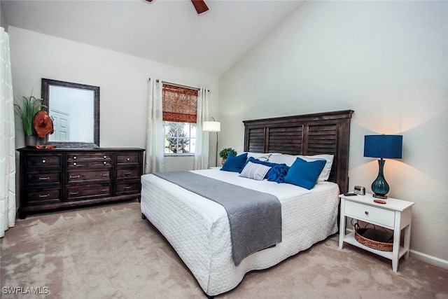 carpeted bedroom featuring ceiling fan and lofted ceiling