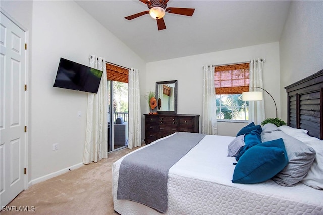 bedroom with ceiling fan, carpet flooring, and vaulted ceiling