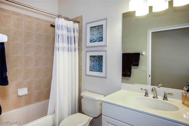 full bathroom featuring shower / bath combination with curtain, vanity, and toilet