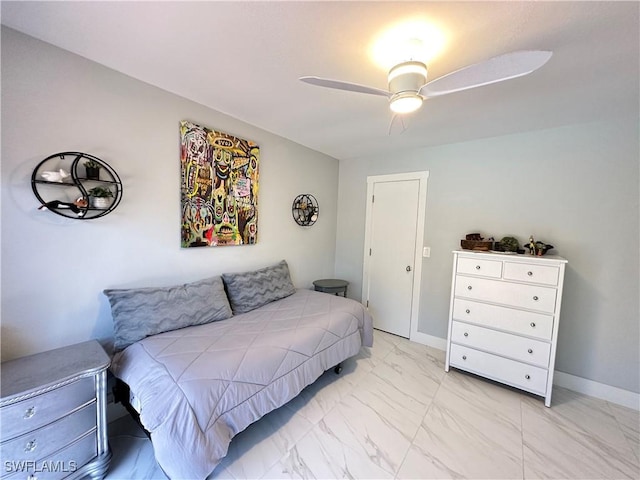 bedroom featuring ceiling fan