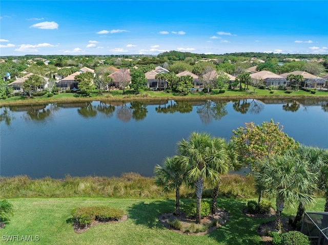 drone / aerial view with a water view