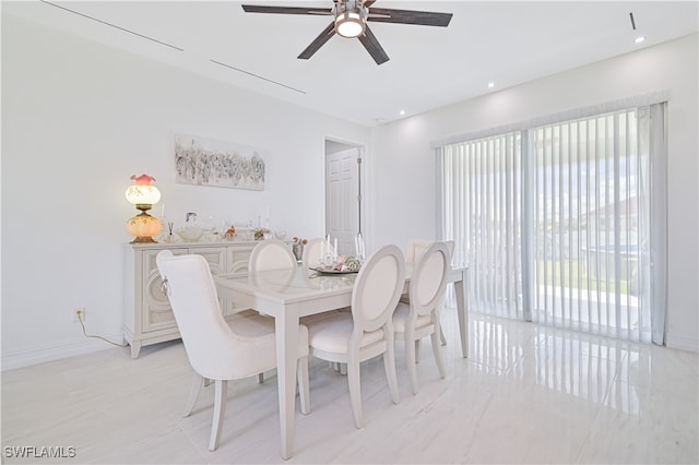 dining space featuring a wealth of natural light and ceiling fan