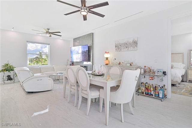 dining space with ceiling fan