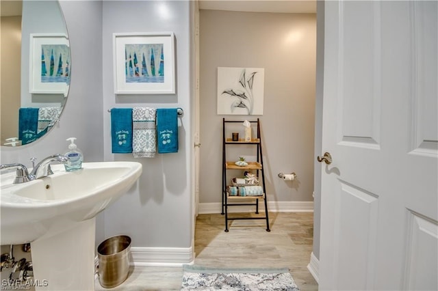 bathroom featuring hardwood / wood-style flooring