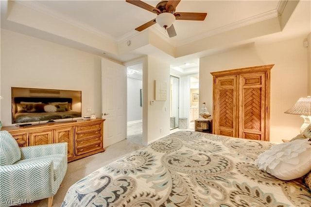 carpeted bedroom featuring ornamental molding and ceiling fan