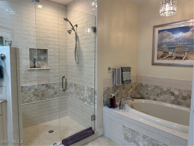 bathroom with a chandelier and plus walk in shower