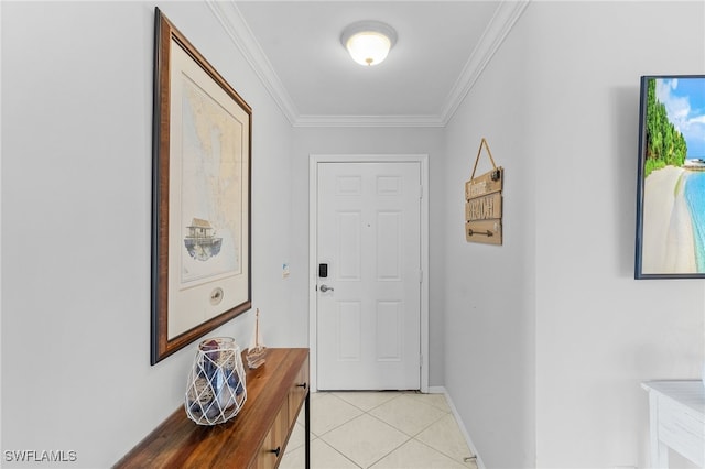 interior space with ornamental molding and light tile patterned flooring