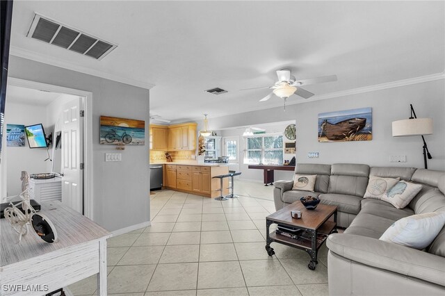 tiled living room featuring crown molding and ceiling fan