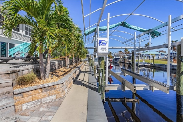 dock area with a water view