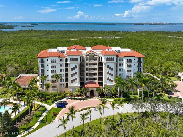 birds eye view of property featuring a water view