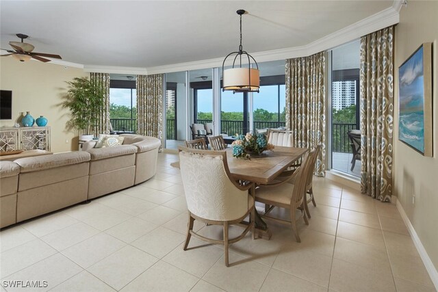 dining area featuring crown molding, ceiling fan, and light tile patterned floors