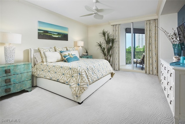 carpeted bedroom with access to outside, ornamental molding, and ceiling fan