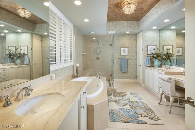 bathroom with separate shower and tub, tile patterned floors, and vanity