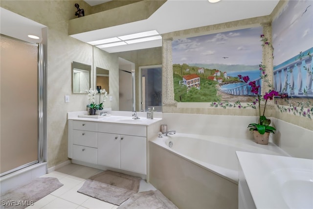 bathroom with independent shower and bath, vanity, and tile patterned flooring