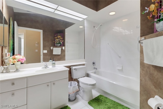 full bathroom with  shower combination, vanity, tile patterned flooring, and toilet