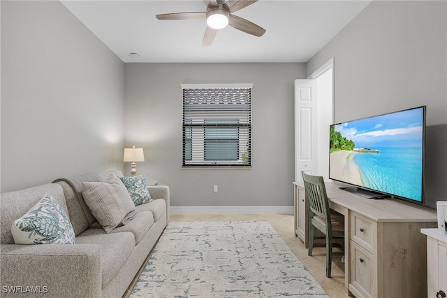 carpeted office with ceiling fan