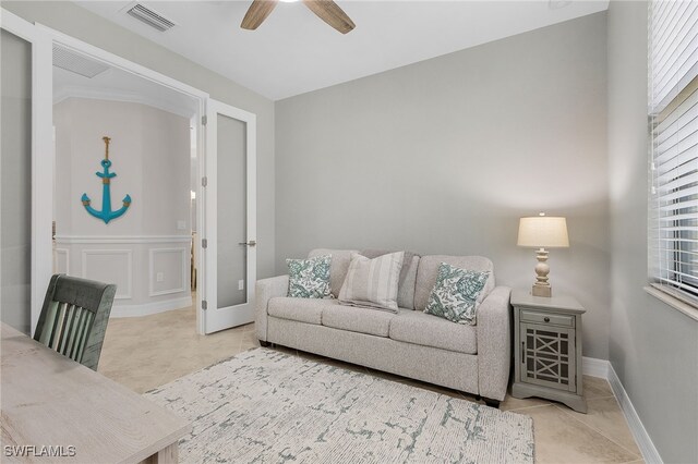 living room with ceiling fan