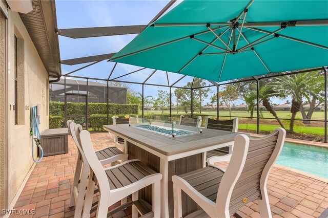 view of patio with a lanai