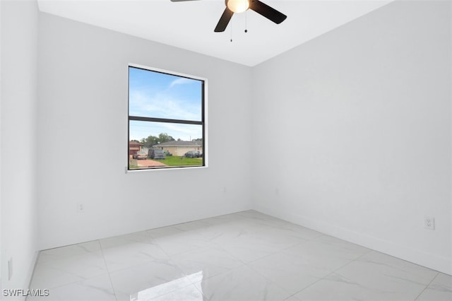 empty room featuring ceiling fan