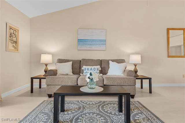 living room featuring vaulted ceiling