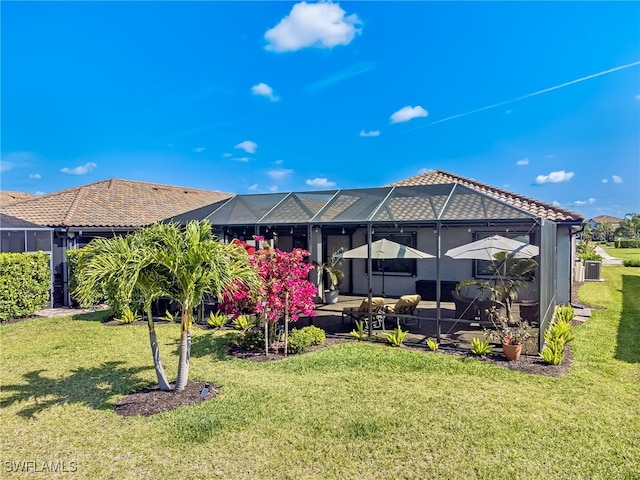 view of yard featuring a lanai and a patio