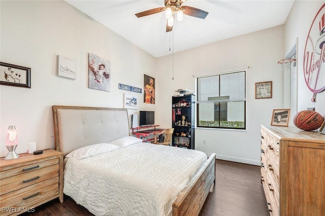 bedroom featuring ceiling fan and dark hardwood / wood-style flooring