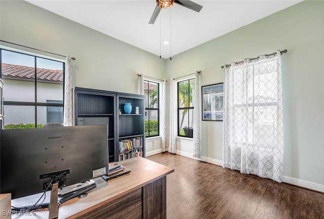 office area featuring dark wood-type flooring and ceiling fan