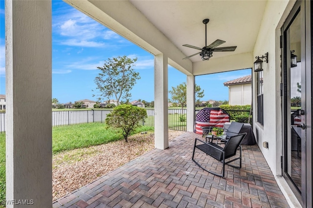 view of patio / terrace featuring ceiling fan